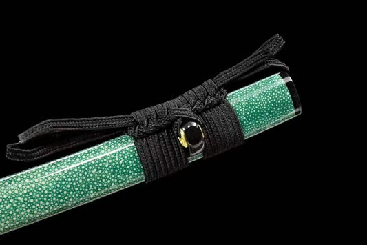 A close-up of the saya, featuring a full wrap of genuine green rayskin, a sign of high-quality craftsmanship.