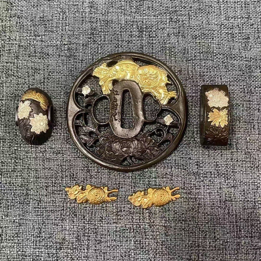 Complete Koshirae set with "Shishi & Botan" (Lion & Peony) theme, featuring a large gilded Shishi and silvered Botan on a textured black brass Sukashi Tsuba.