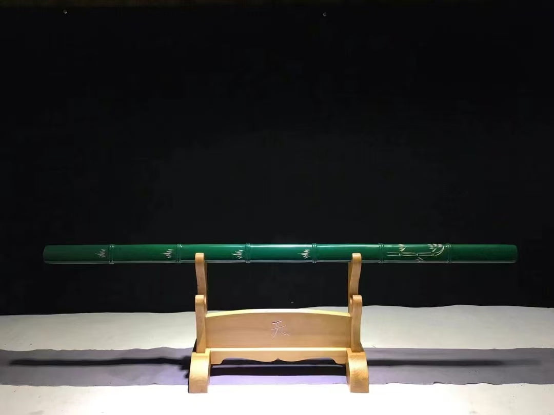 A full-length view of the sheathed Green Phantom Bamboo Blade, highlighting its seamless green bamboo disguise.