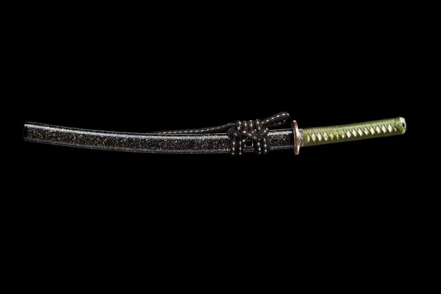 A close-up of the green sageo cord tied onto the kurikata of the "Starry Sky" lacquered saya.