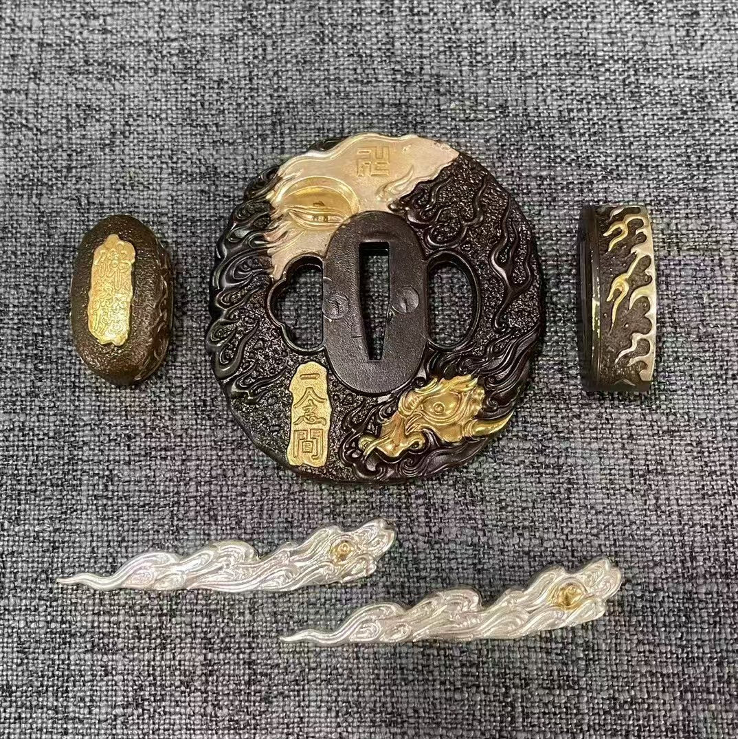 Complete Koshirae set featuring a silvered guardian deity face and a gilded dragon on a textured black brass Tsuba, with matching dual-tone Fuchi, Kashira, and Menuki.
