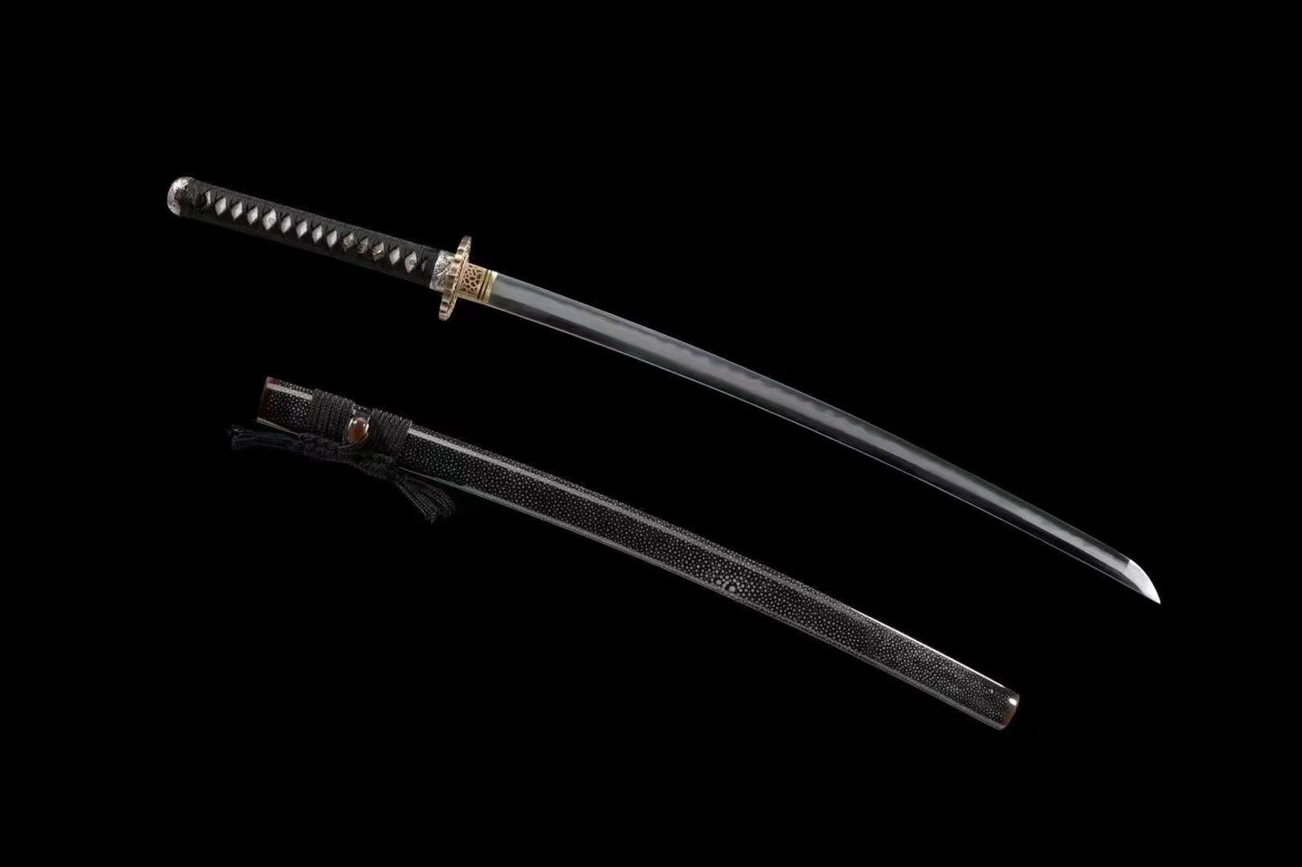 A full view of the unsheathed Great Wave Katana, showcasing its Hadori-polished, folded 1095 steel blade.