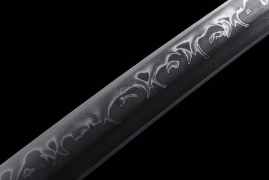 A close-up of the T10 steel blade, showcasing the rare and complex full-temper Hitatsura hamon.