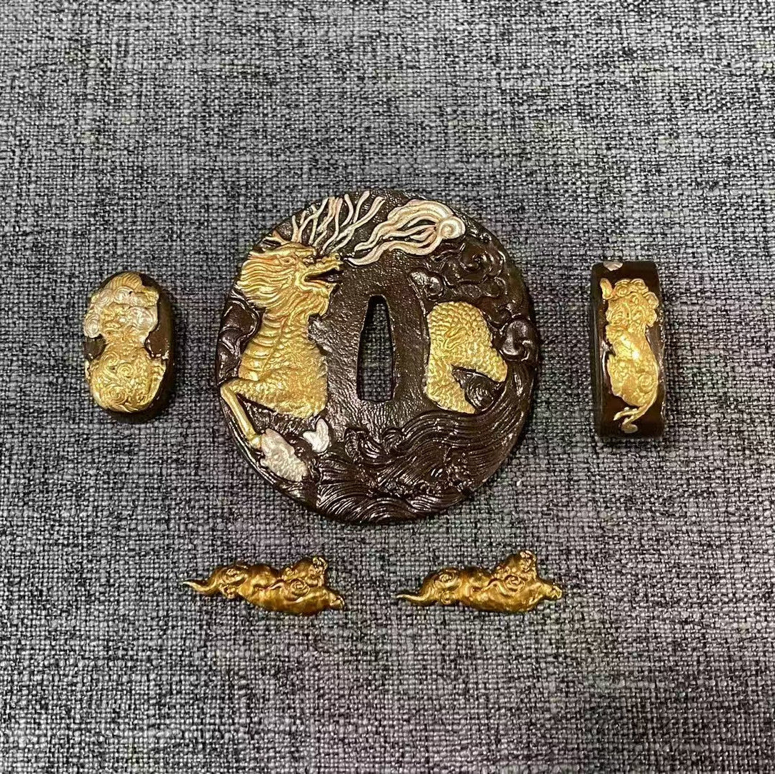 Complete Koshirae set featuring a gilded and silvered Kirin (celestial beast) on a textured black brass Tsuba, with matching Fuchi, Kashira, and Menuki.