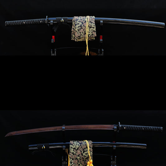 The Kuro Akane Katana, shown both sheathed in its black lacquer saya and unsheathed, revealing the unique red and black folded 1060 steel blade.