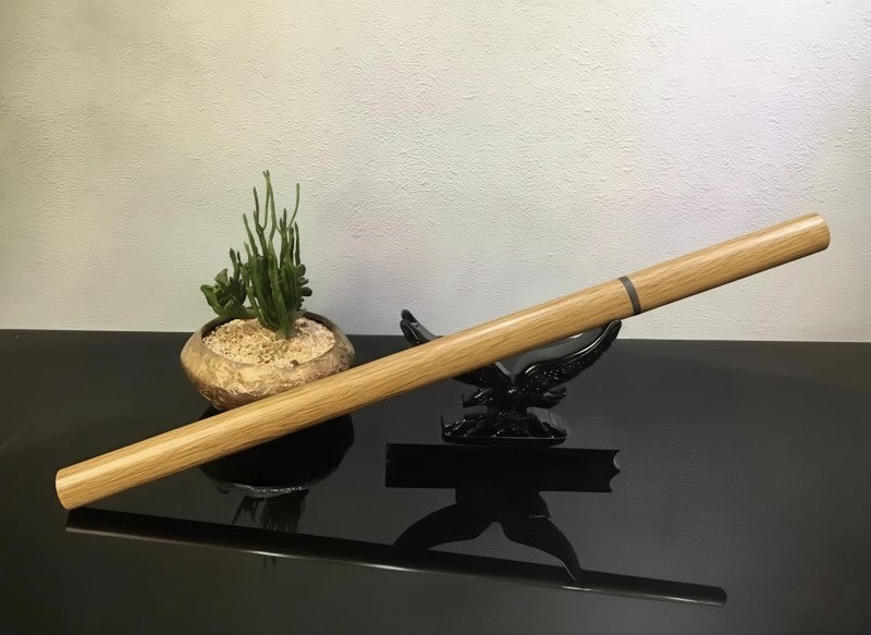 The Rosewood Ninja Sword fully sheathed, showcasing the continuous grain of the Huali Wood (Rosewood) saya.