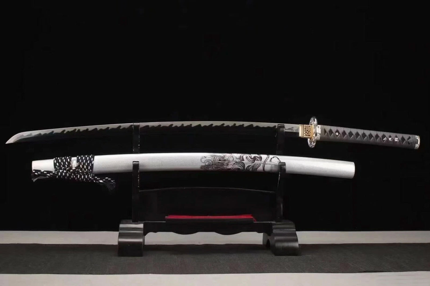 The Silver Dragon Katana unsheathed on a display stand, showing the T10 steel blade and the matte silver dragon saya.