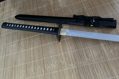 An alternate full-length view of the through-hardened 9260 spring steel blade and its matching saya.