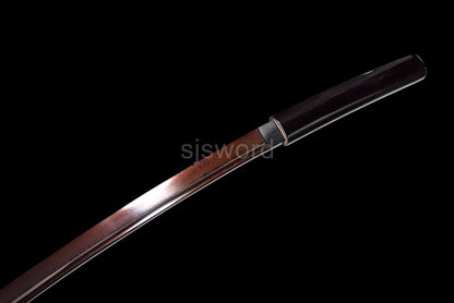 A view showcasing the sori (curvature) of the red and black folded steel blade.