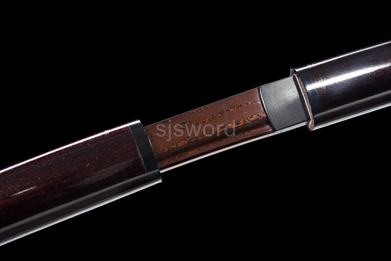 A close-up of the joint between the handle and saya of the Aurora Steel Red Shirasaya.