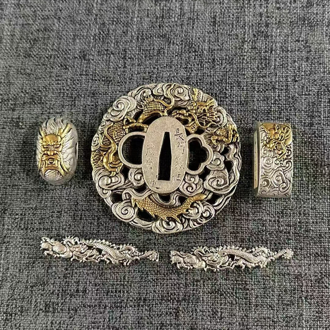 Gilded and silvered brass Koshirae set, featuring a Hannya mask on the Kashira and golden dragons in silver clouds on the Tsuba, Fuchi, and Menuki.