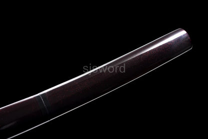A full view of the hardwood saya with its burgundy red speckled lacquer finish.