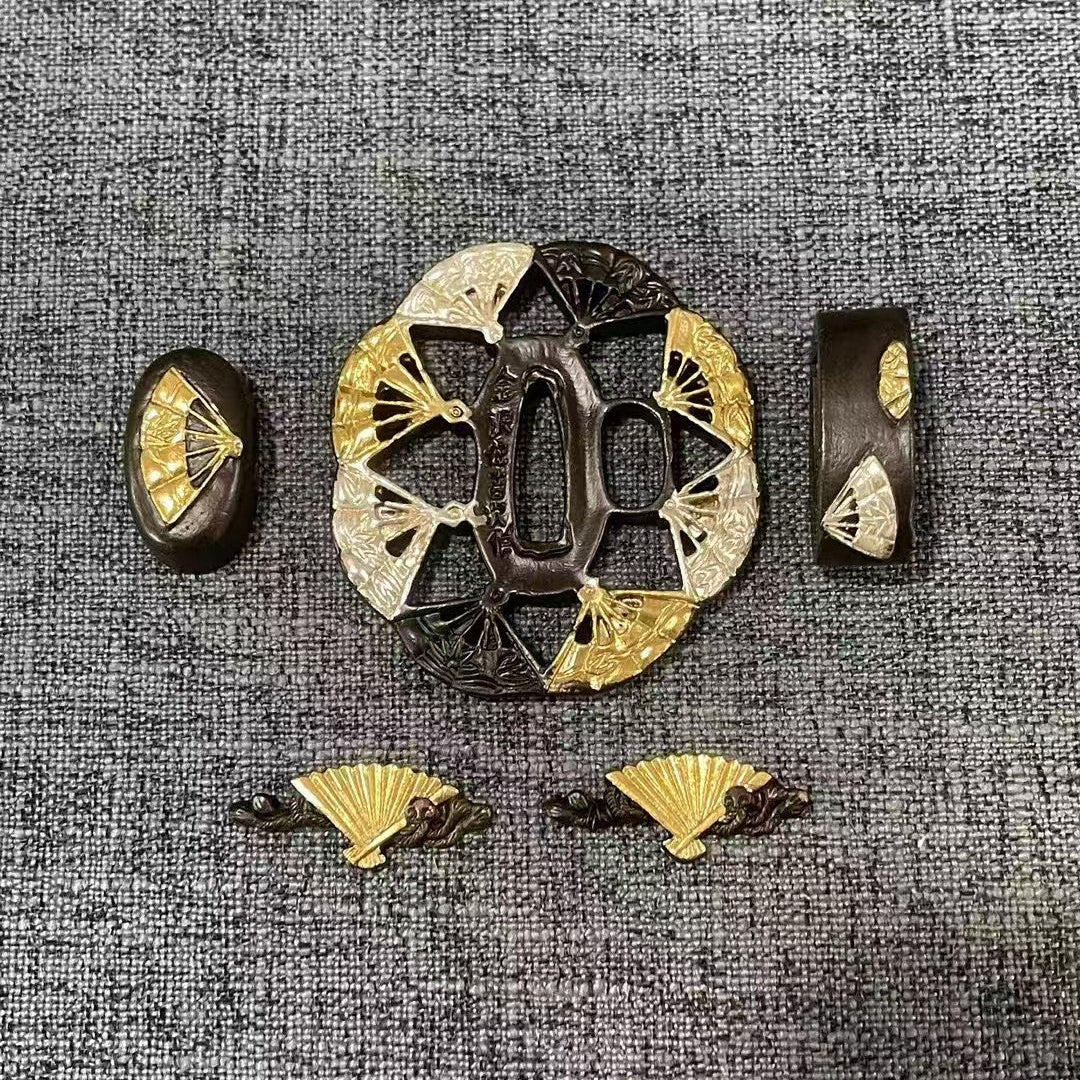 Complete Koshirae set featuring a Gilded & Silvered Sensu (folding fan) Sukashi Tsuba, with matching dual-tone Fuchi, Kashira, and Menuki.