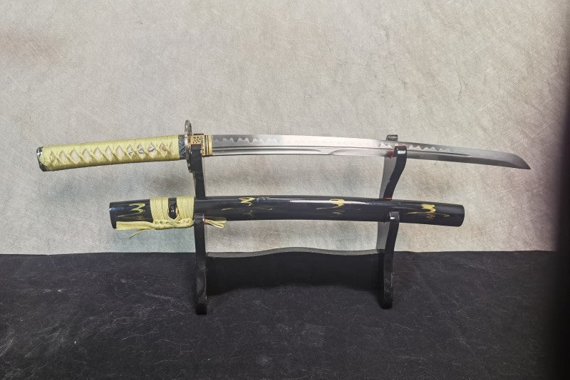 The Lightning Vein Wakizashi, fully sheathed in its gloss-black saya featuring a gold lightning motif.