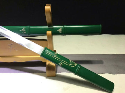 A close-up of the Green Phantom's handle and saya, showcasing the expertly crafted green bamboo-style carving and paint.