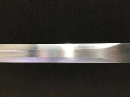 A macro shot of the hand-forged, through-hardened high carbon steel blade of the Green Phantom Ninja Sword.