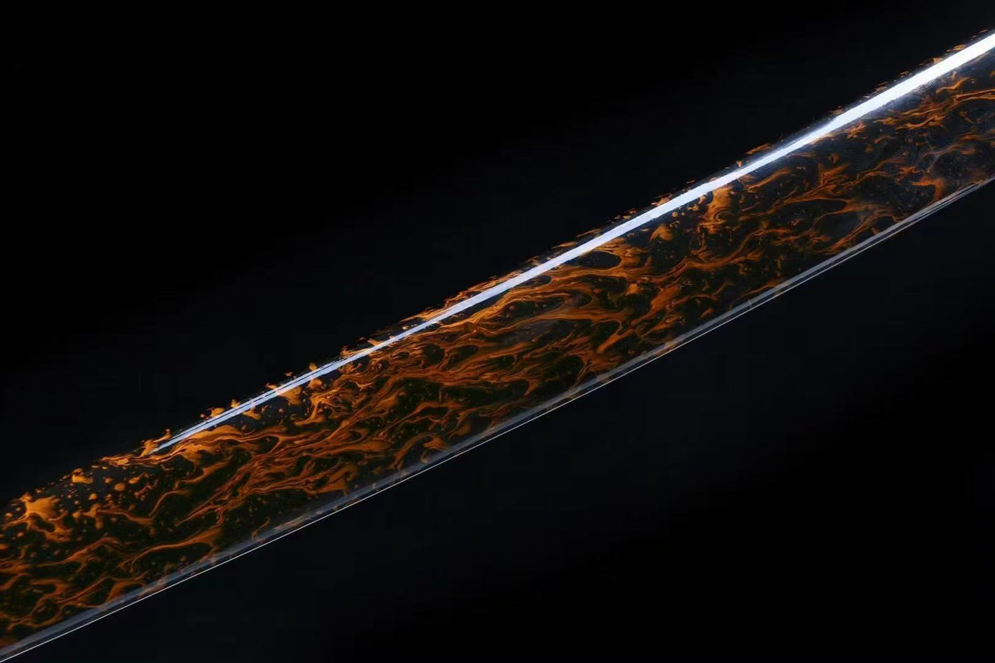 A close-up of the hardwood saya, showcasing the beautiful and unique Kawari-nuri style lacquer finish.