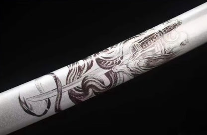 A detailed close-up of the matte silver lacquer saya of the Silver Dragon Katana, featuring its unique etched dragon motif.