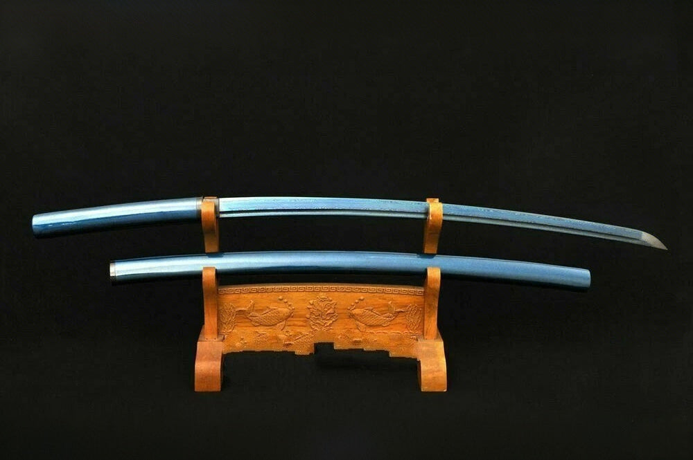 The Aurora Steel Blue Shirasaya with its metallic blue speckled lacquer finish, resting on a display stand.