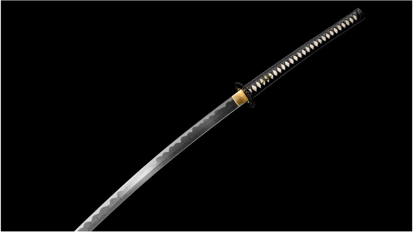 Full folded 1095 steel nodachi blade, showing the continuous hamon from habaki to kissaki.