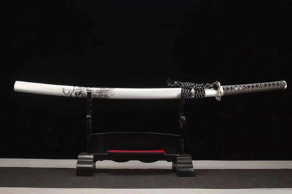The complete Silver Dragon Katana, fully sheathed in its matte silver dragon saya, resting on a display stand.