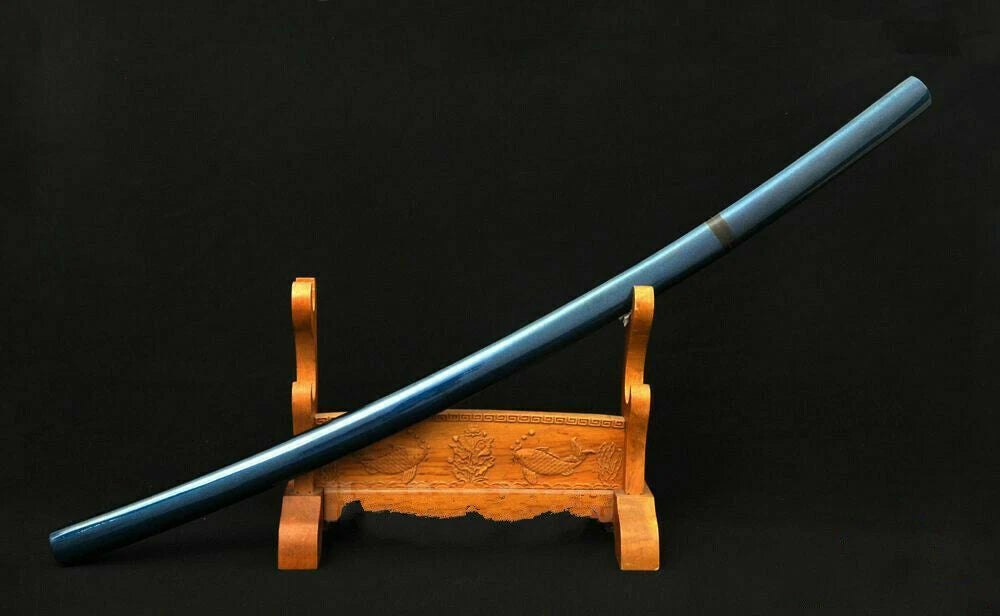 A full-length side view of the sheathed Aurora Steel Blue Shirasaya, showing its metallic blue lacquer finish.