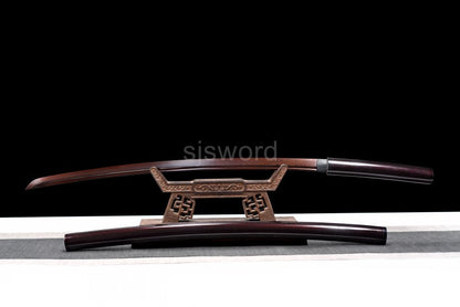 An alternate angle of the sheathed Aurora Steel Red Shirasaya on its display stand.