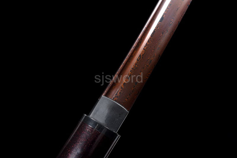 A detailed shot of the tsuka handle, highlighting the burgundy red speckled lacquer finish.