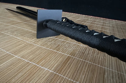 A side profile of the tsuka handle and square tsuba on the Obsidian Gale through-hardened ninja sword.