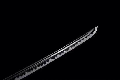 A full view of the hand-polished T10 steel blade, displaying the entire length of the Aesthetic hamon.