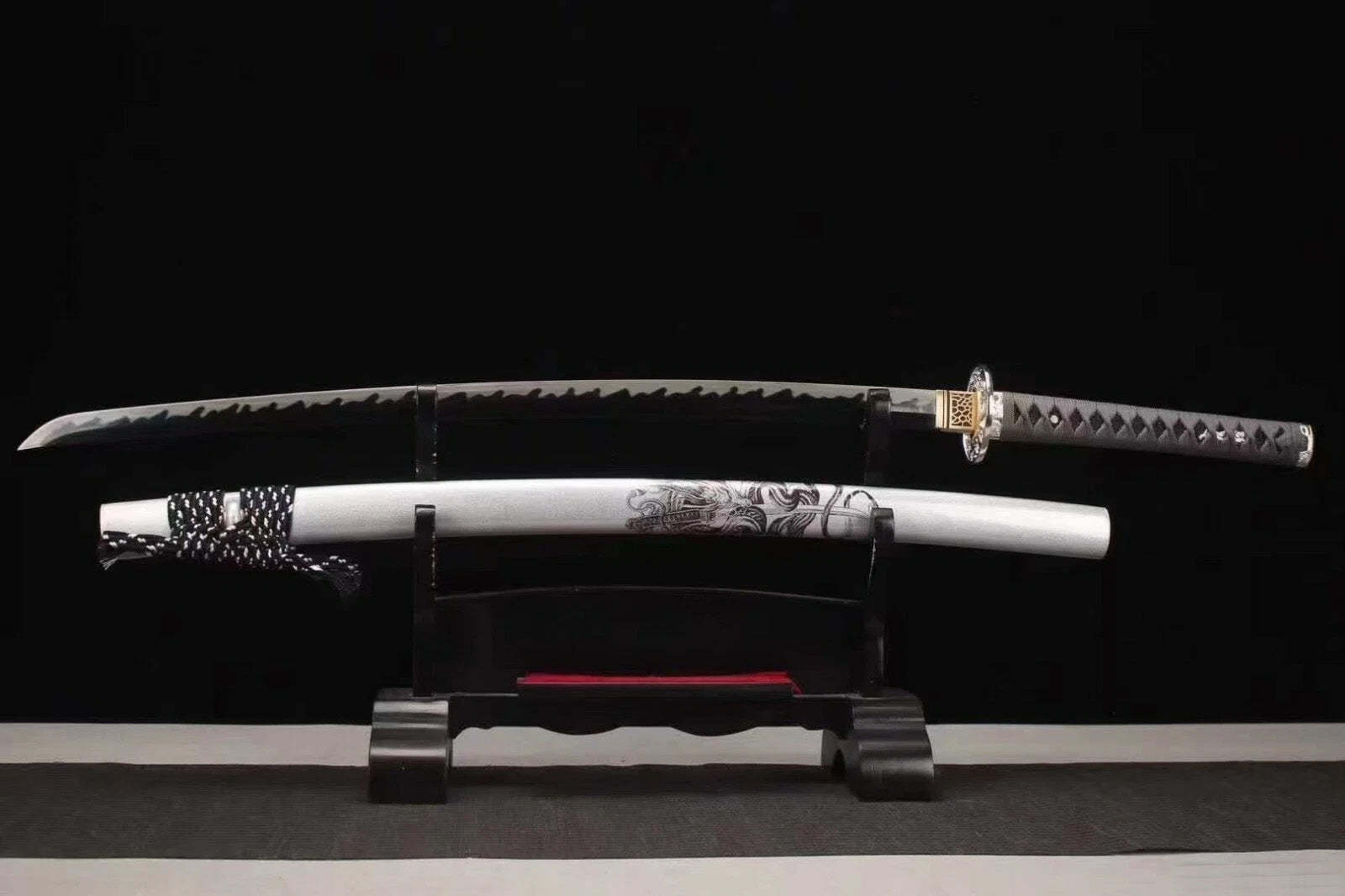 The Silver Dragon Katana unsheathed on a display stand, showing the T10 steel blade and the matte silver dragon saya.