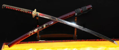 The unsheathed Raden Ryū Katana with its T10 steel blade, crossed over the Raden inlay saya.