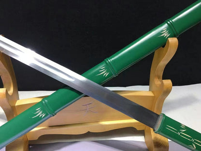 The Green Phantom Bamboo Blade with its through-hardened steel blade, crossed over the green bamboo-style saya on a stand.