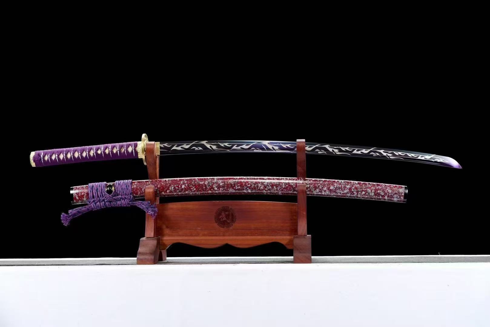 The unsheathed Amethyst Flame Katana and its saya displayed together on a display stand.