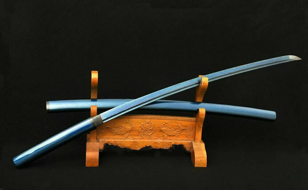 The unsheathed Aurora Steel Shirasaya on a display stand, showing the full Blue Damascus blade.
